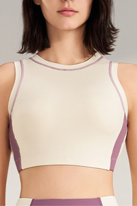 Women's color-blocked sleeveless sports bra.