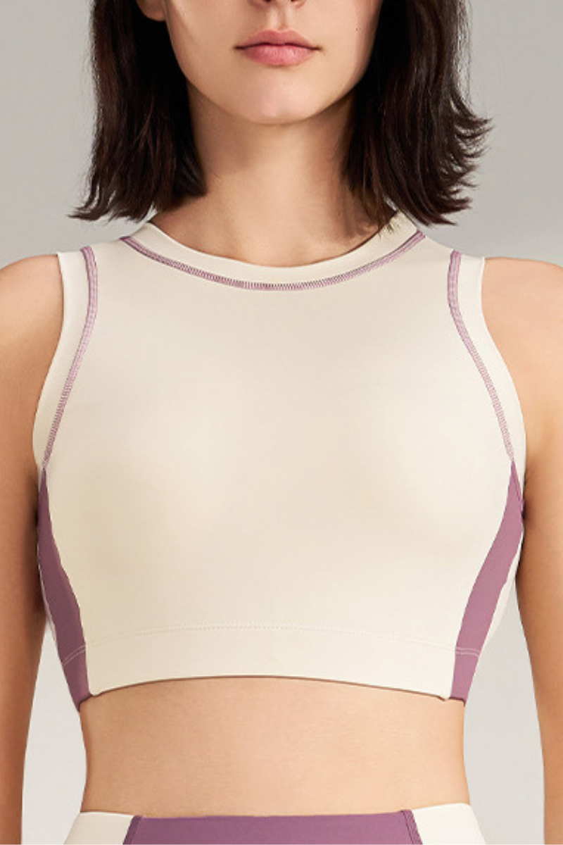Women's color-blocked sleeveless sports bra.
