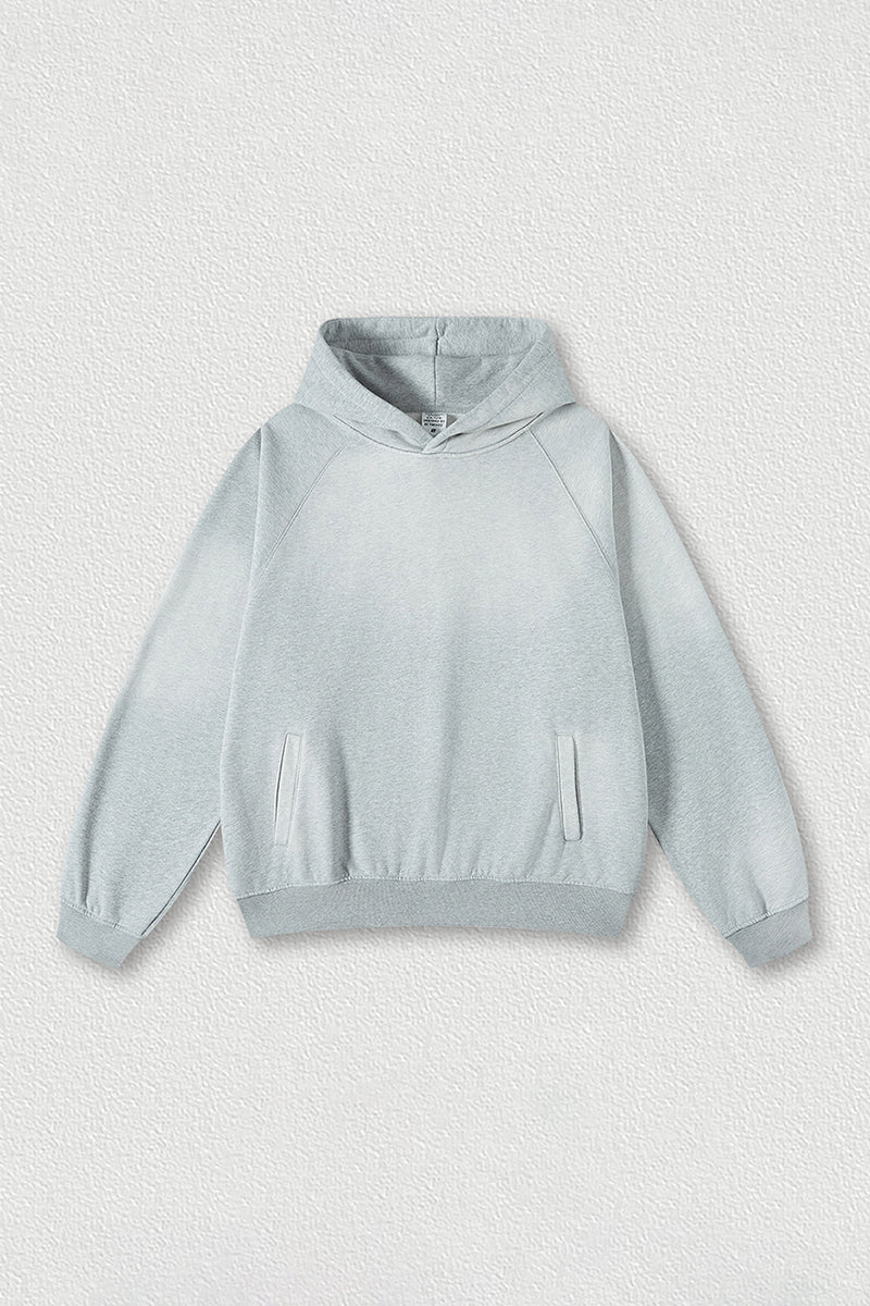 Washed raglan sleeve hooded sweatshirt